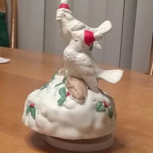 Spinning bird musical figure, bisque porcelain